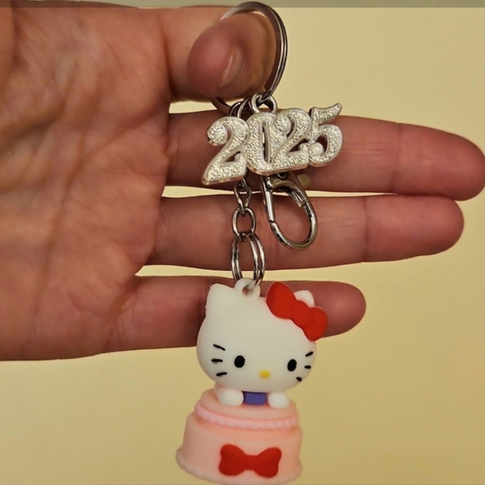 1/$6 or 2/$10 NWOT Hello Kitty Key Chain Bag Charm.